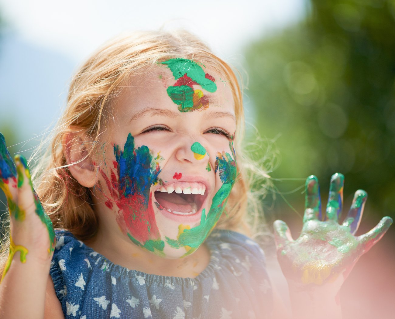 Child Playing With Colourful Paint